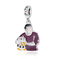 Man Holding a Puppy Charm