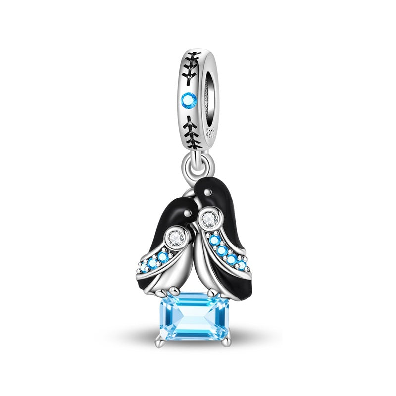 Cuddling Penguin Charm